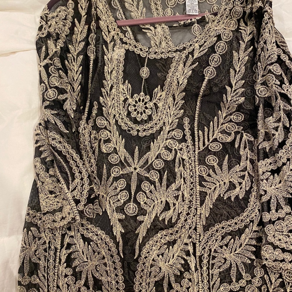 Black and gold sparkly blouse